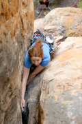Kate Dooley squeezing herself through two cruxes of "Electra" (19), one of Araps more famous heinous offwidths.