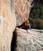 Kent arriving at the belay atop P3.