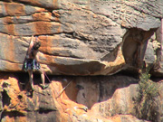 Unknown climber leading Lofty Odours, grade 21 on the Wall Of Fools.