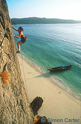 Rachel Carr leading Travels With My Aunt (6a), Hin Tak Wall, Koh Phi Phi Island, Thailand.