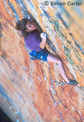 Lynn Hill on pitch two (crux) of Serpentine (29, 5.13b, 8a) on Taipan Wall in The Grampians, Victoria, Australia.