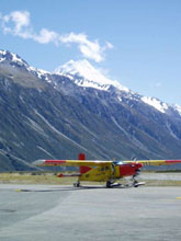Porter Ski Plane taxing at Mt Cook Airport with Mt Cook in the background.