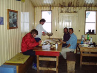 Lunch time at Plateau Hut (left to right: Johnny, Patrice, David and author)