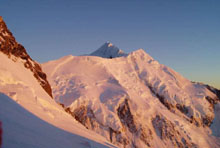 Morning sunlight hitting Silberhorn and Mt Tasman from high on the upper part of the Linda Glacier.