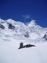 Plateau Hut toilet with Mt Tasman, Syme Ridge and Mt Lendenfeld in the background.